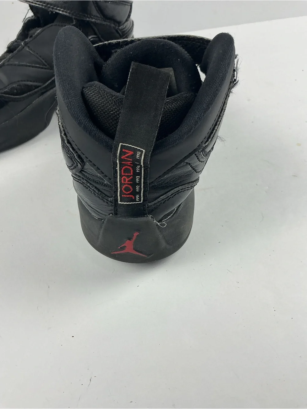 Jordan Black Kids' High-Top Sneakers with Red Jumpman Accents they need inserts
